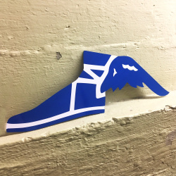 Retro Goodyear Flying Shoe Metal Sign